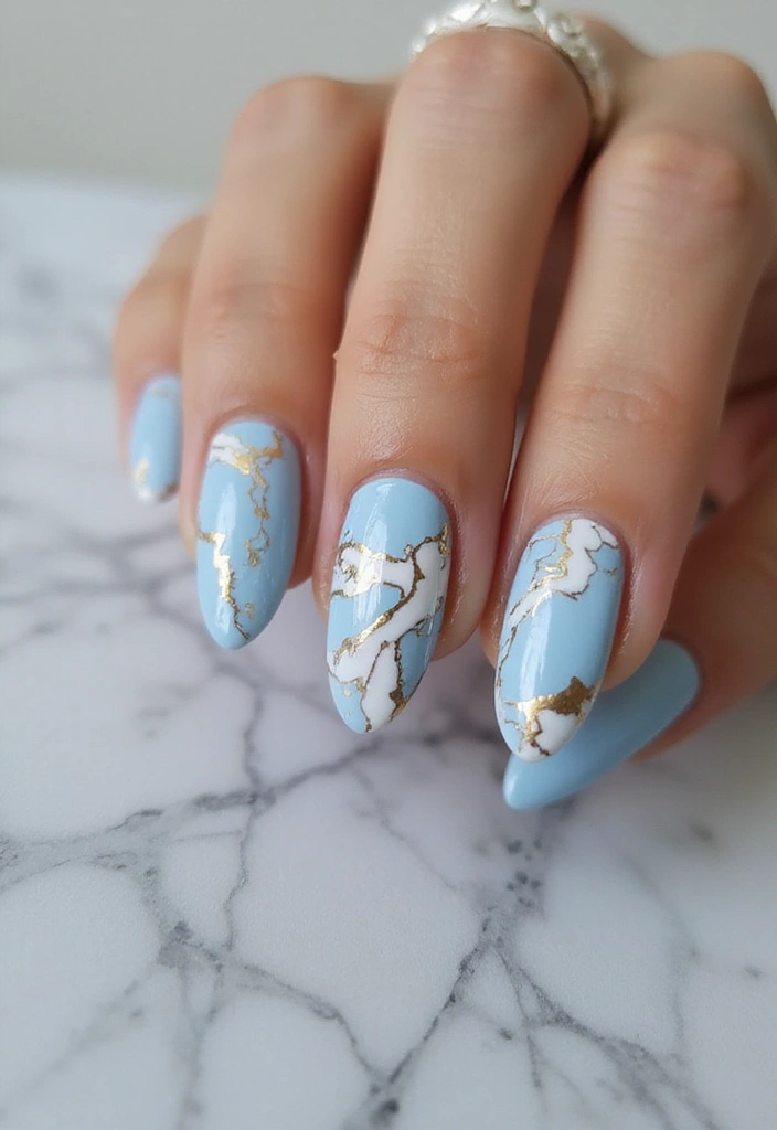 15 Stunning Light Blue Nail Designs for Spring 2025 That Will Make You Melt! - 5. Marble Effect