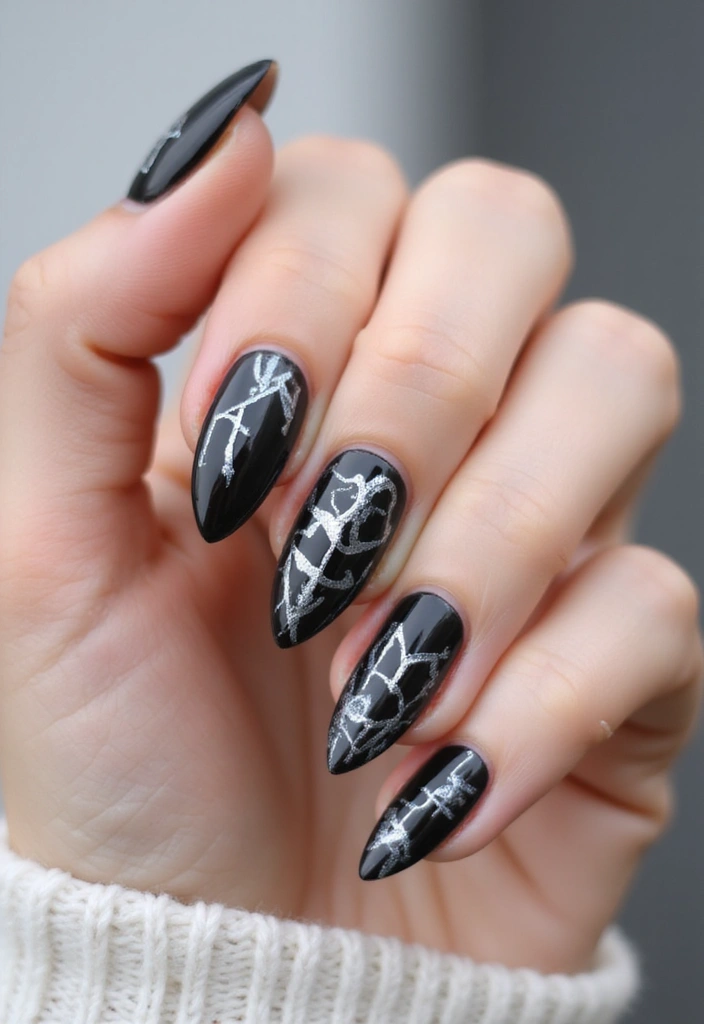 15 Glamorous Almond-Shaped Black and Silver Nail Designs to Try This Season! - 10. Negative Space Designs